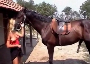 Horse and blonde at the farm